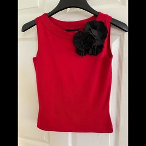 August Silk Red Sleeve Less Sweater with attached Black Flower